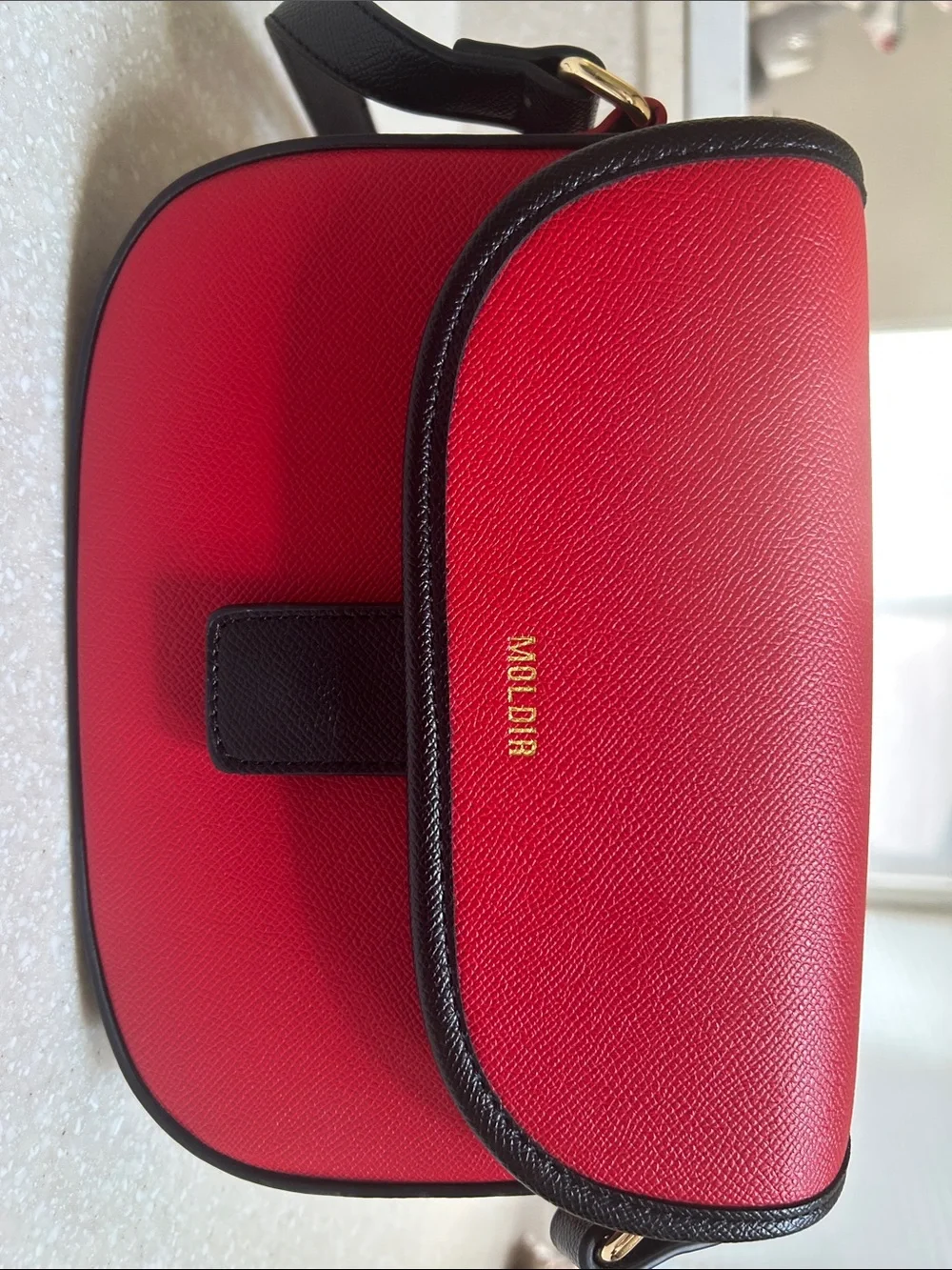 Moldir Red Crossbody Bag with Black Trim